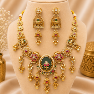 Antique Matte Gold Sovereign Gaja Heritage Suite with Intricate Elephant Filigree and a Deep Oval Emerald Cabochon