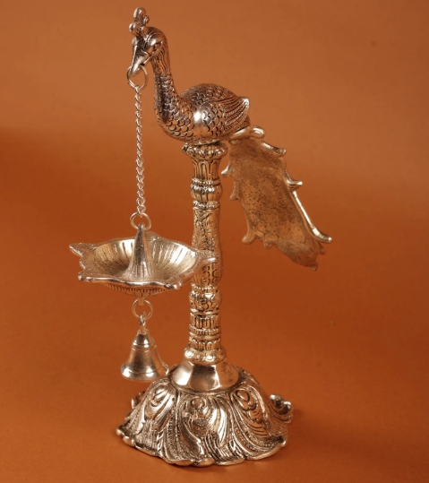 Elegant Silver-Plated Peacock Diya Stand with Hanging Bell - Image 2