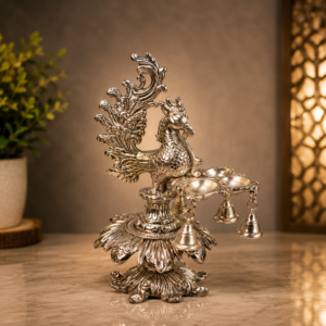 Handcrafted German Silver Peacock Diya Stand with Hanging Bells